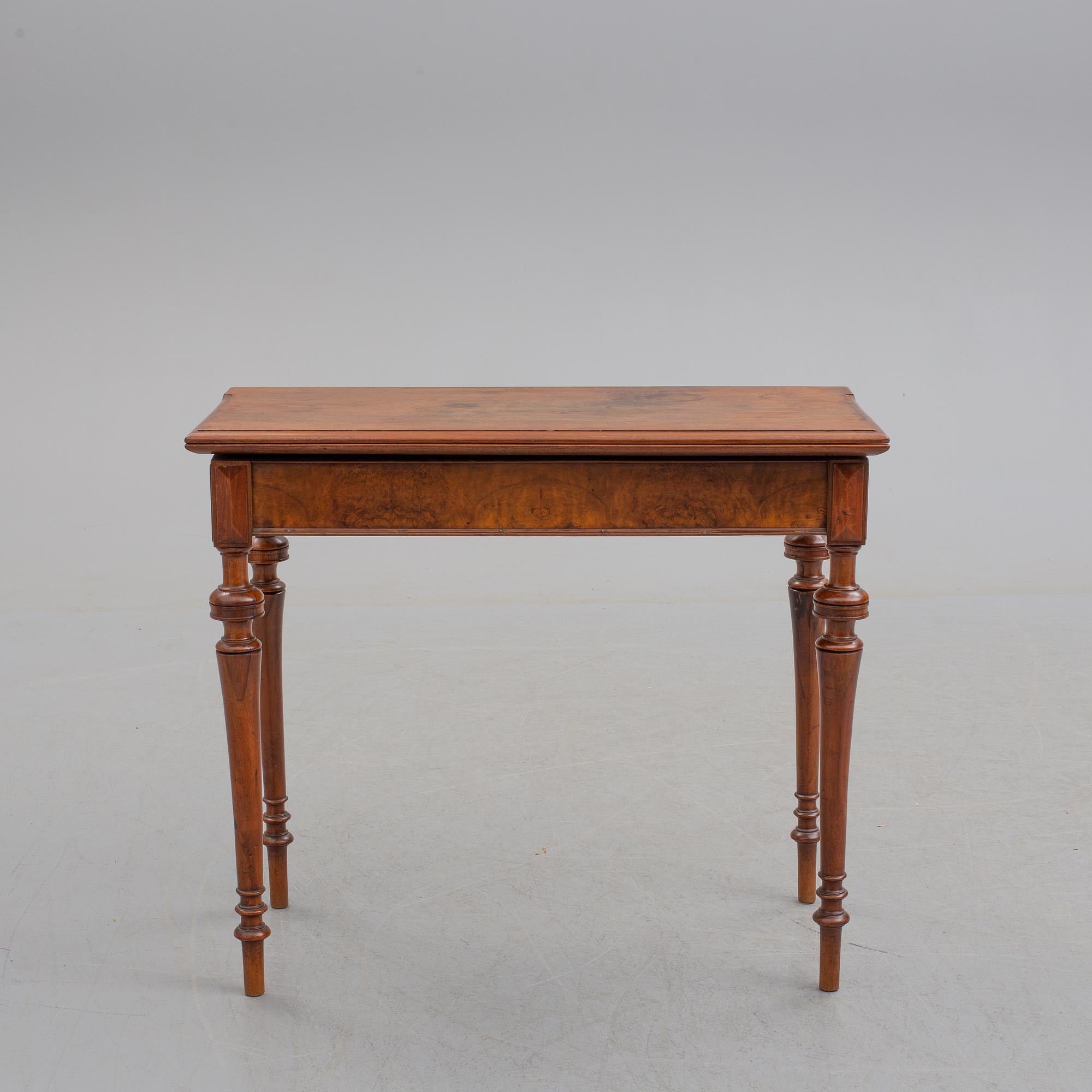 A late 19th century mahogany card table.