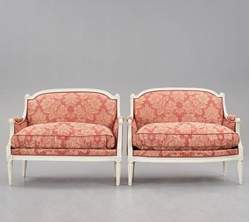 A pair of Louis XVI late 18th Century armchairs by M. dela Porte (Paris 1765-1784).