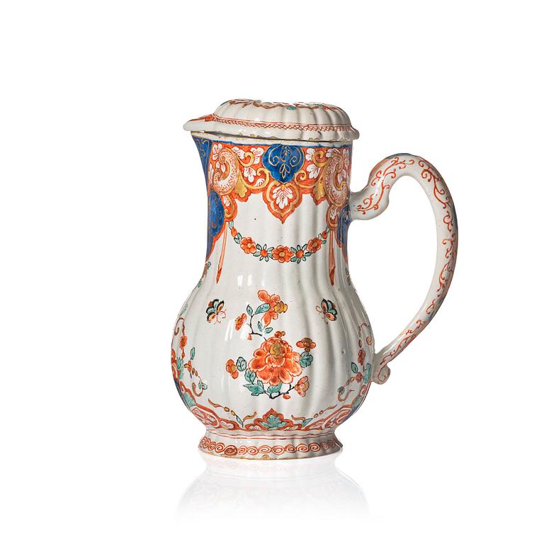 A Dutch Delft polychrome faience ewer, early 18th Century.