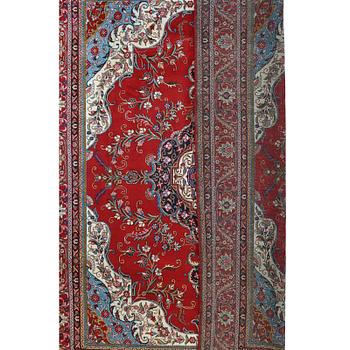 A Tabriz carpet, c 394 x 302 cm.