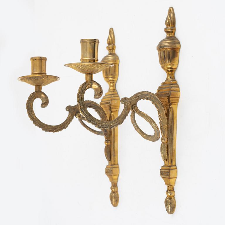 A pair of 'Törne' brass one-light wall ligths from IKEA's 18th Century collection.