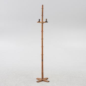 A floor candlestick, 19th Century.