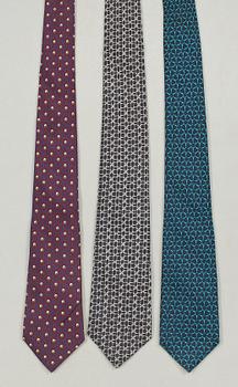 1314. A set of three silk ties by Hermès.