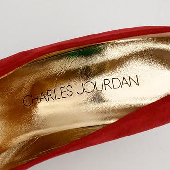 CHARLES JOURDAN, a pair of red suede pumps with matching shoulder bag.