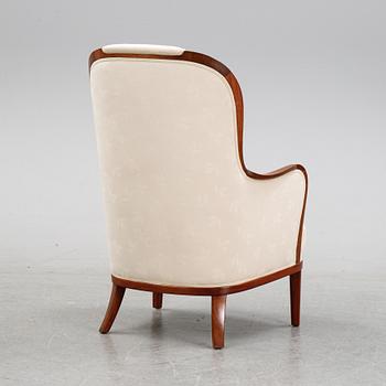 An 'Advokaten' lounge chair by Carl Malmsten, second half of the 20th Century.