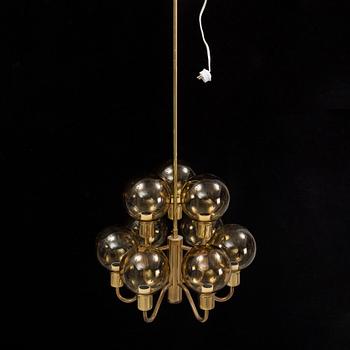 Hans-Agne Jakobsson, a late 20th century brass and glass ceiling lamp for nine lights, Markaryd, Sweden.