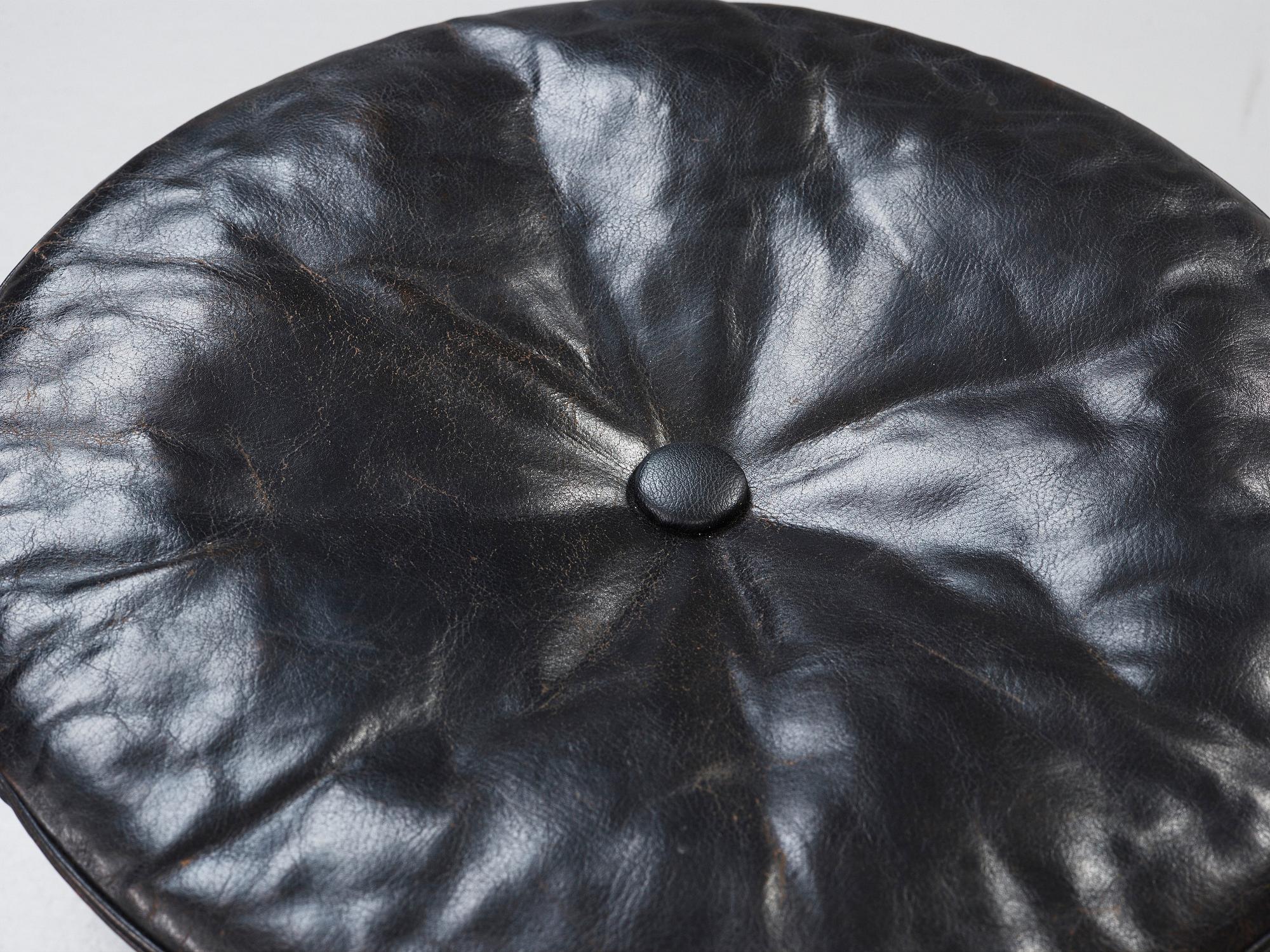 Poul Kjaerholm, a 'PK-33' steel and black leather stool, E Kold Christensen, Denmark 1960's.