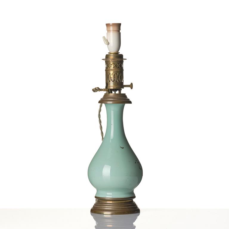 A celadon vase made into a lamp, circa 1900.