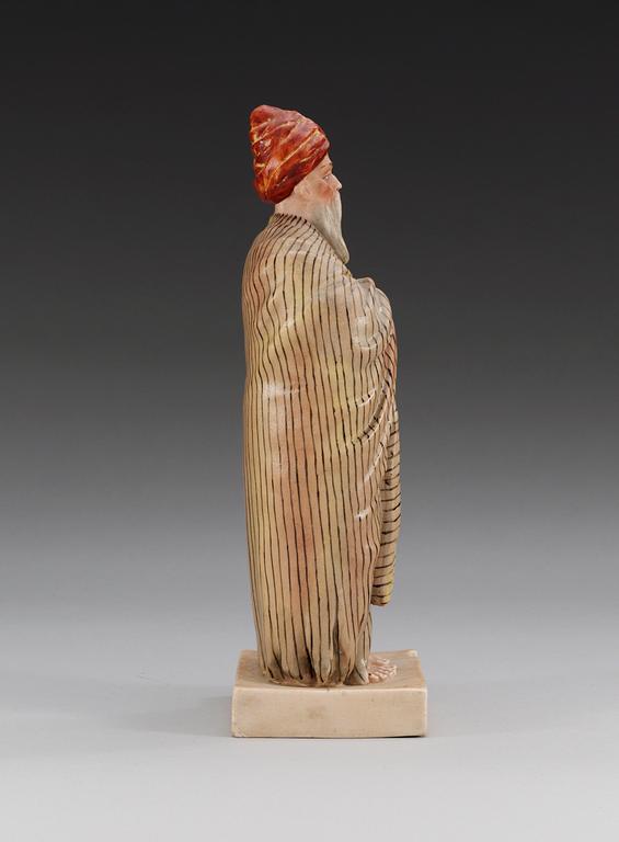 A Russian figure of a man from India, Gardner, ca 1924.