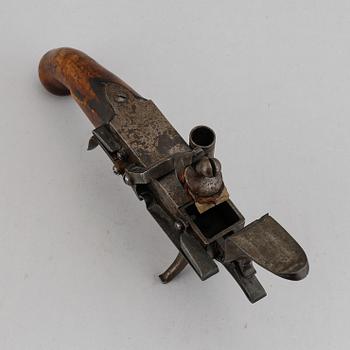 A 18th Century Flintlock lighter.