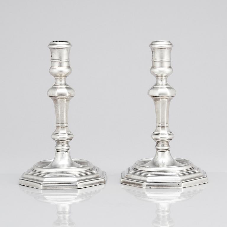 A pair of Italian late 17th/early 18th Century silver candlesticks. Marks of Johann Adolf Gaap (born 1667, died 1724).