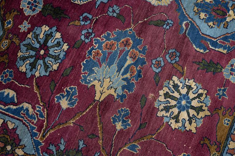 An antique rug, north-west Persian, so-called Vaghire, approx. 136 x 134 cm.