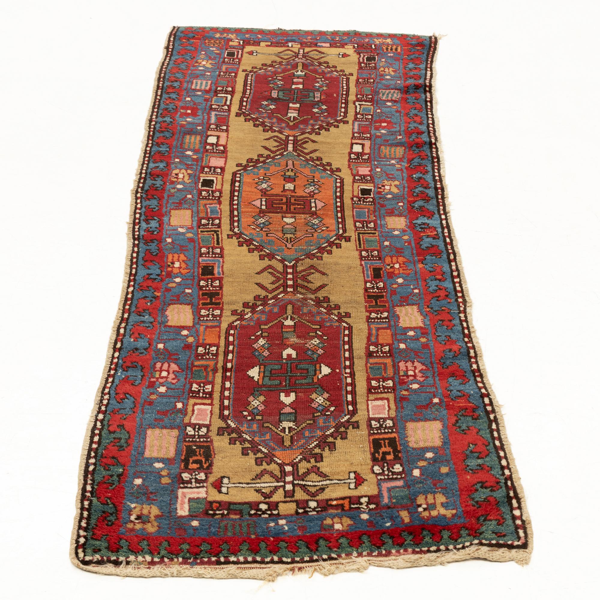 An antique Northwest Persian runner, c. 257 x 99 cm.