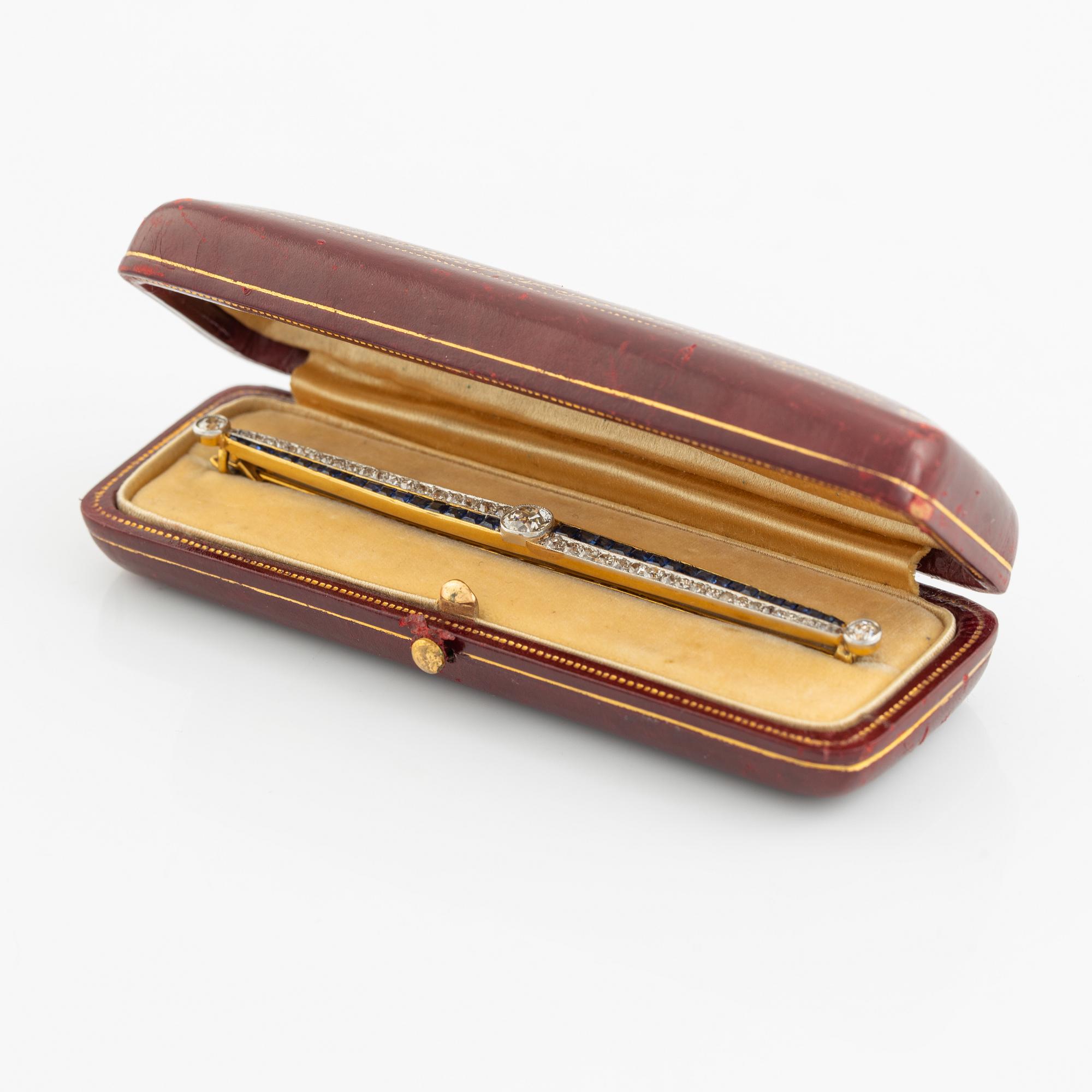 Brosch, gold with old-cut diamonds and princess-cut sapphires.