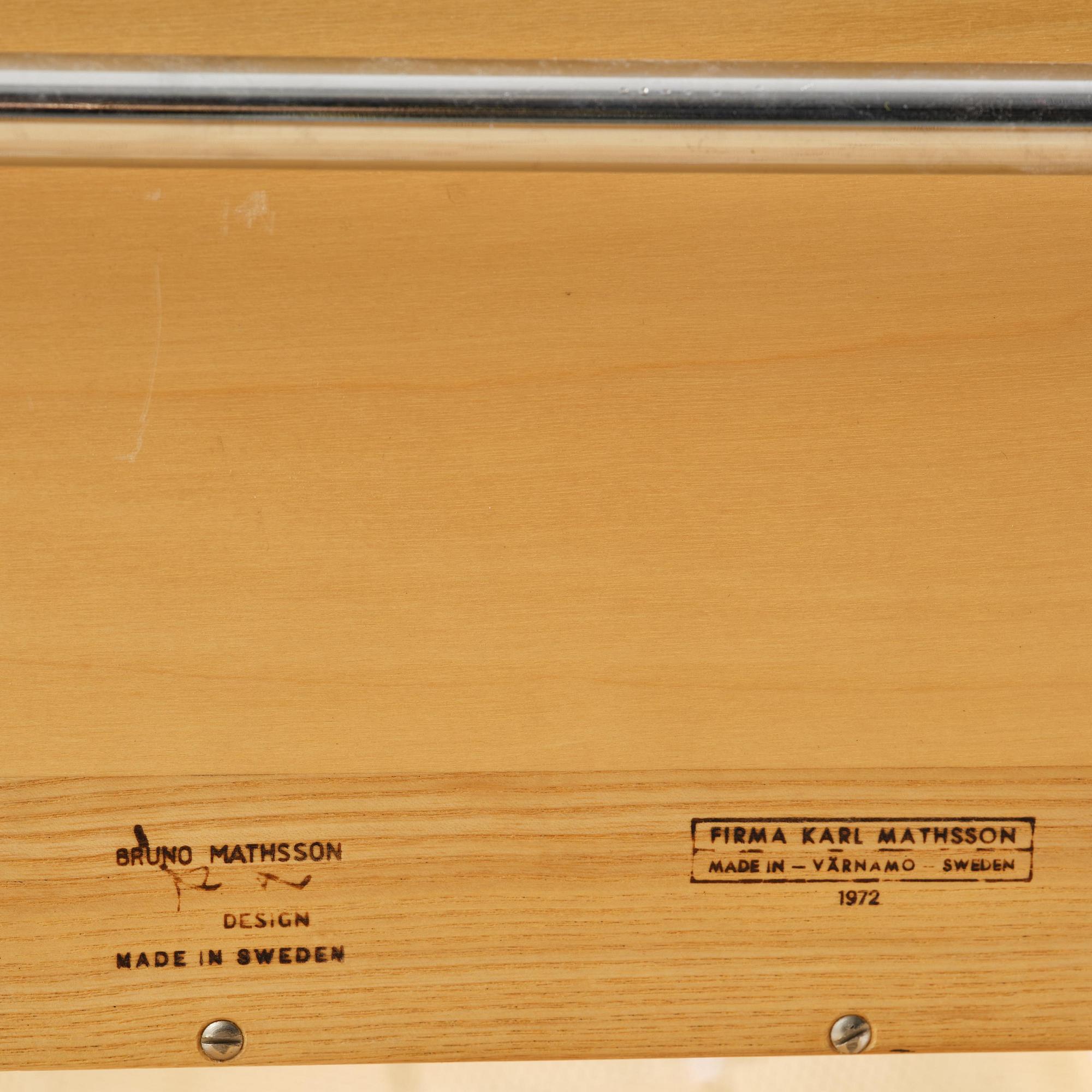Bruno Mathsson, a lounge chair with wheels, Firma Karl Mathsson, Värnamo, 1940s, with reading table from 1972.