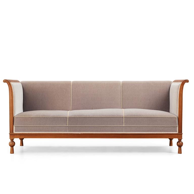 Swedish Grace, a mahogany sofa, reportedly a win in the Stockholm Cabinetmakers association lottery, 1920's.