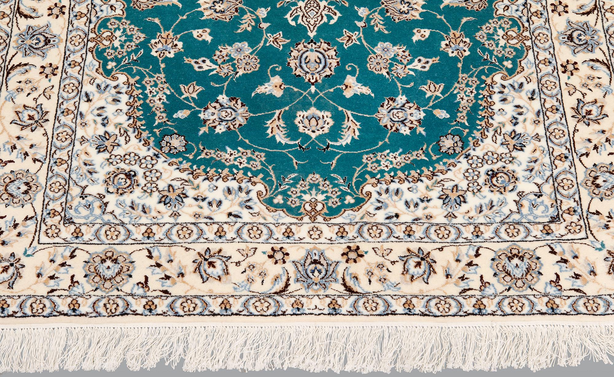 A Nain rug, part silk, so-called 6LAA, approx. 164 x 110 cm.