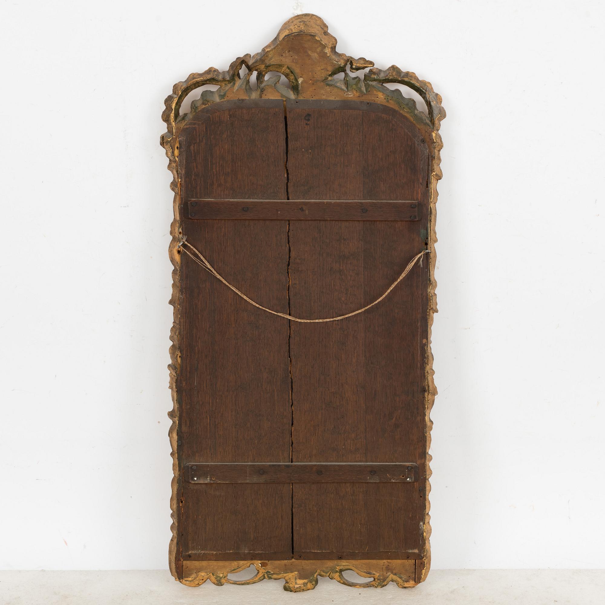 A Rococo mirror, Germany, second half of the 18th Century.