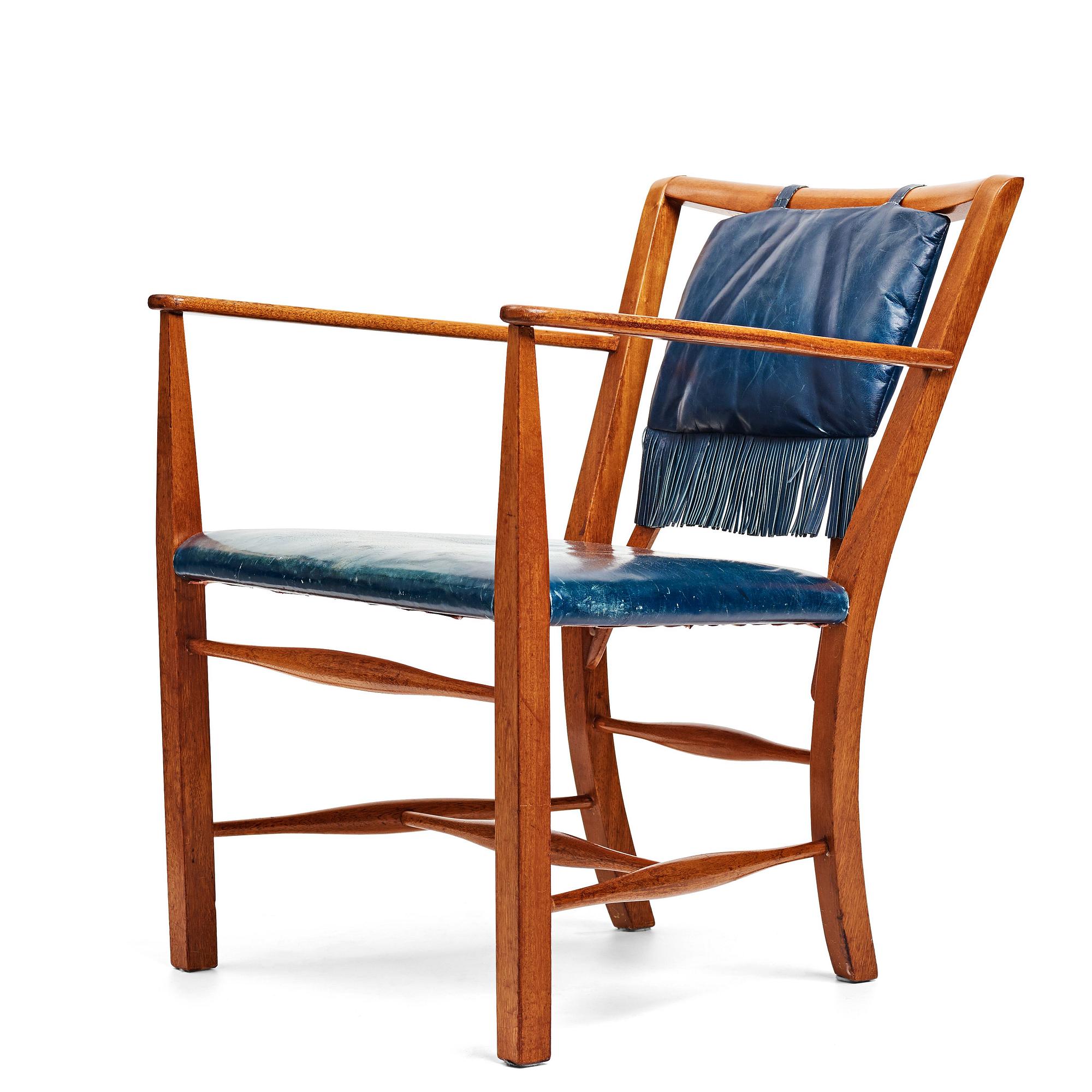 Josef Frank, a mahogany and blue leather chair for Firma Svenskt Tenn, Sweden probably 1950-60's.