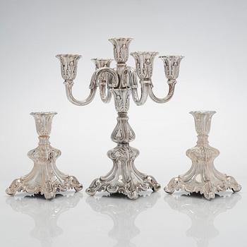 A 5-candle silver candelabra and a pair of candlesticks, silver, Auran Kultaseppä, Turku 1984.