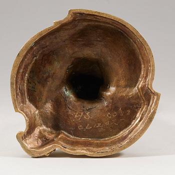 A pair of Louis XV 18th century gilt bronze candlesticks after the model by Juste-Aurèle Meissonnier.