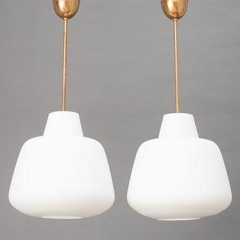 A pair of Swedish Modern ceiling lamps, mid 20th century.