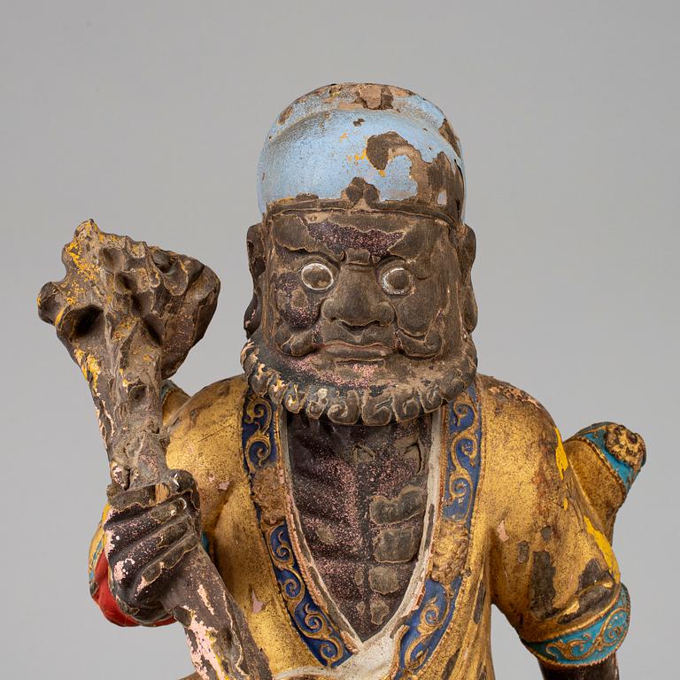 A Chinese wooden figure, 20th century.