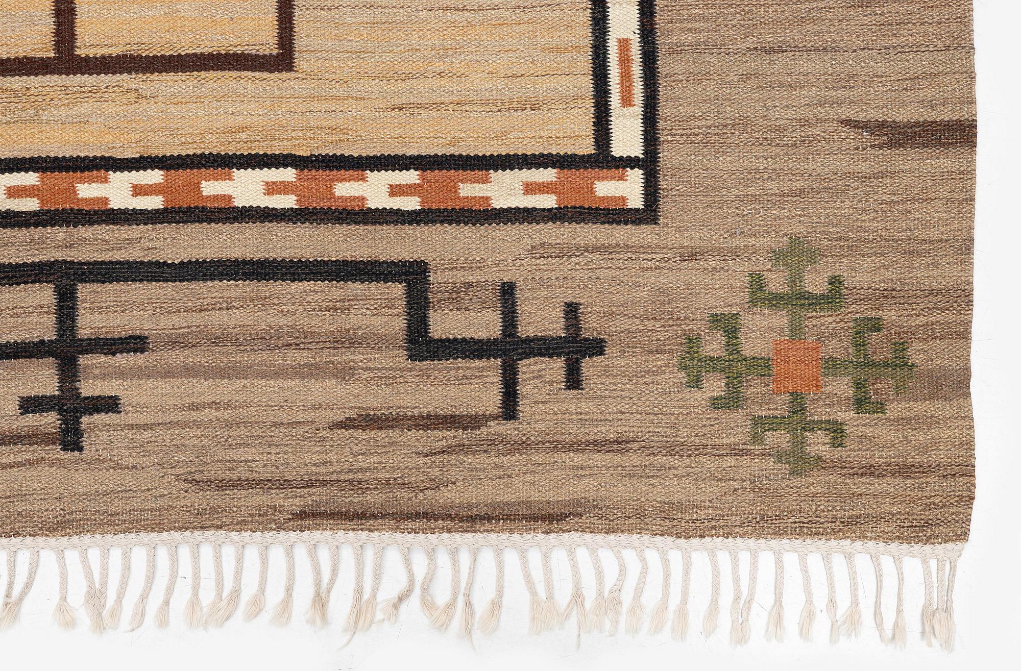 Aina Kånge, a flat weave carpet, c. 310 x 202 cm, signed AK-EJ.