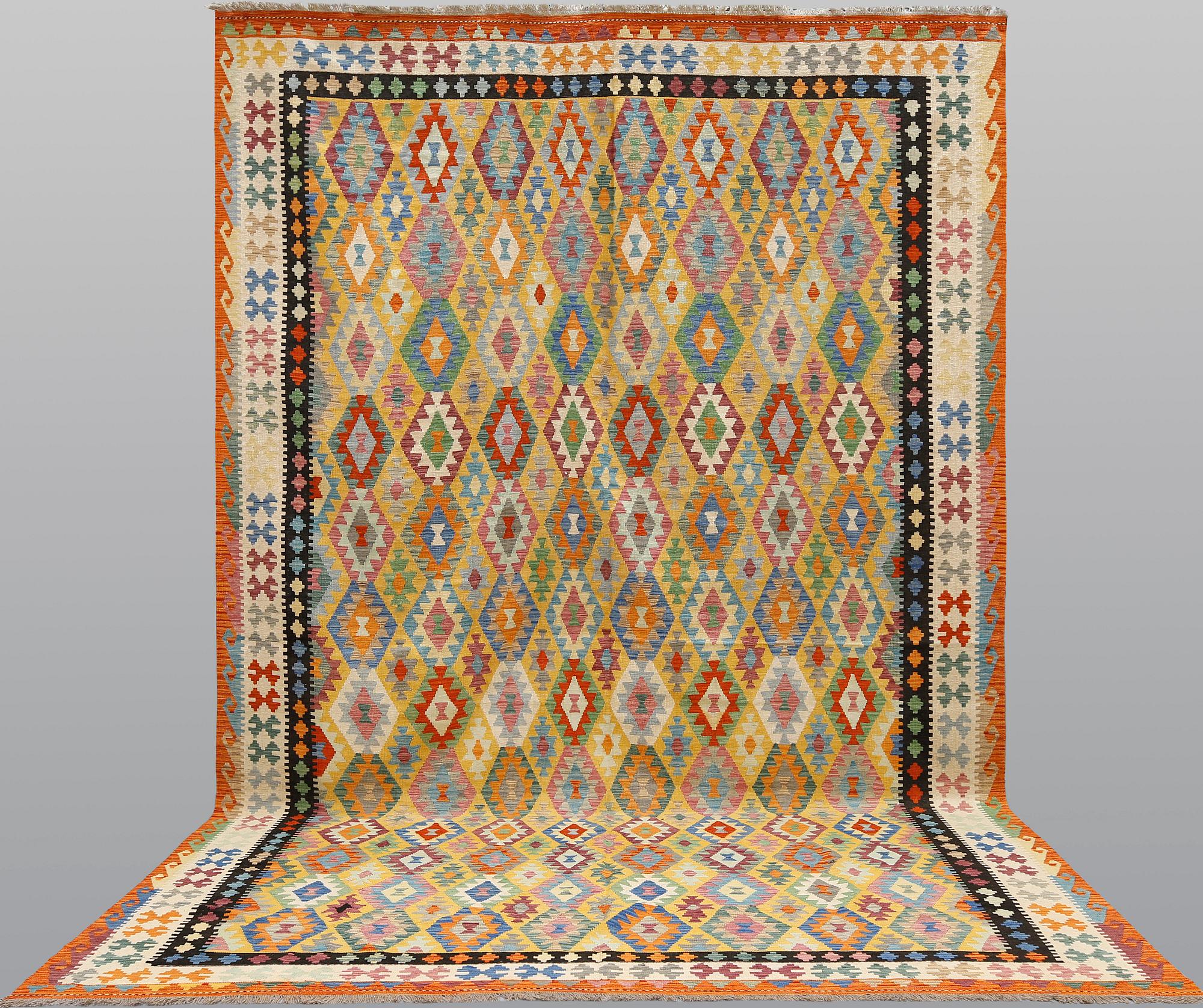 A kilim carpet, ca 486 x 304 cm.
