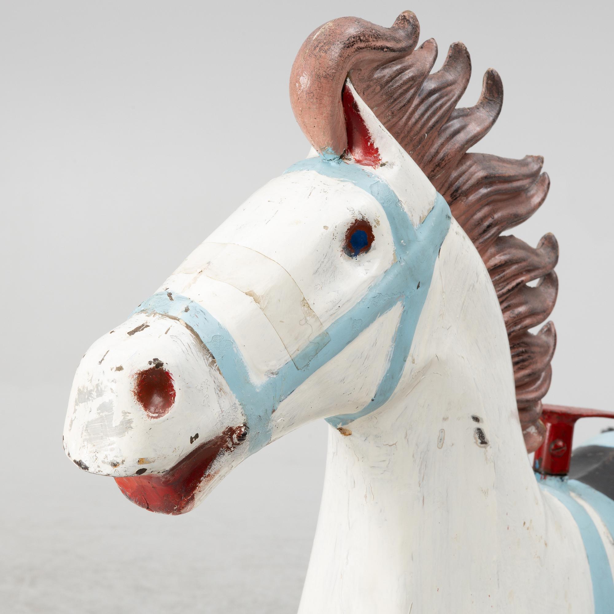 Toy horse with sulky, circa mid-1900s.