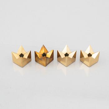 Pierre Forssell, four brass candle holders, Skultuna, Sweden.