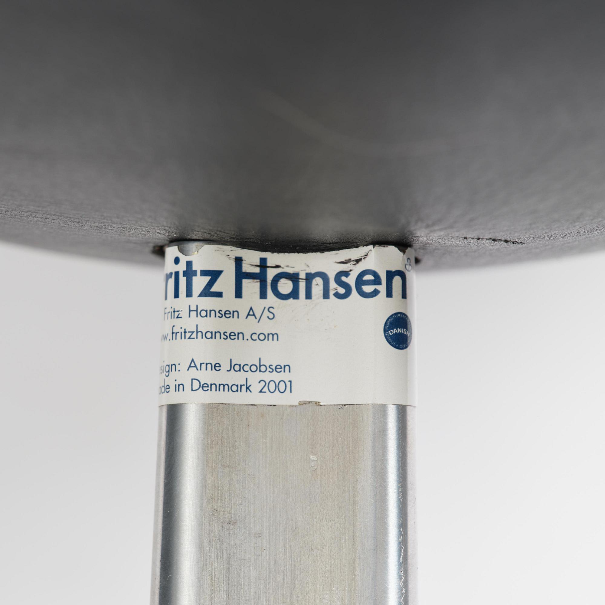 Arne Jacobsen, an "Egg" chair with ottoman, Fritz Hansen, Denmark, 2001.