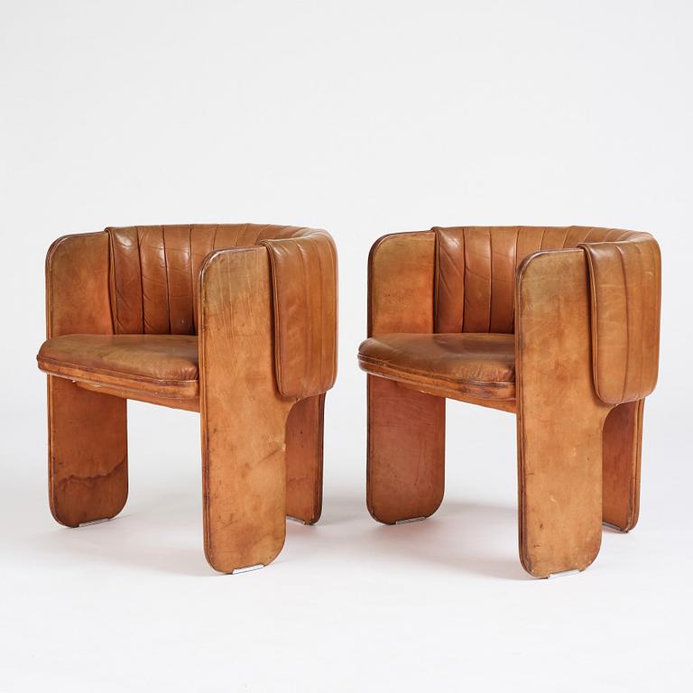 Luigi Massoni, a pair of easy chairs, Poltrona Frau, Italy 1970's.