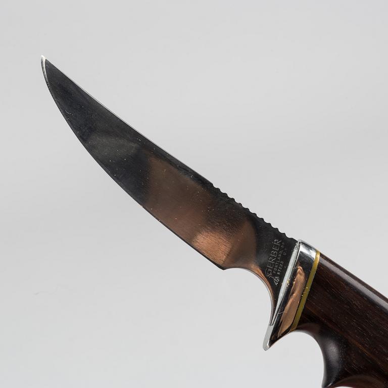 A USA Gerber hunting knife.