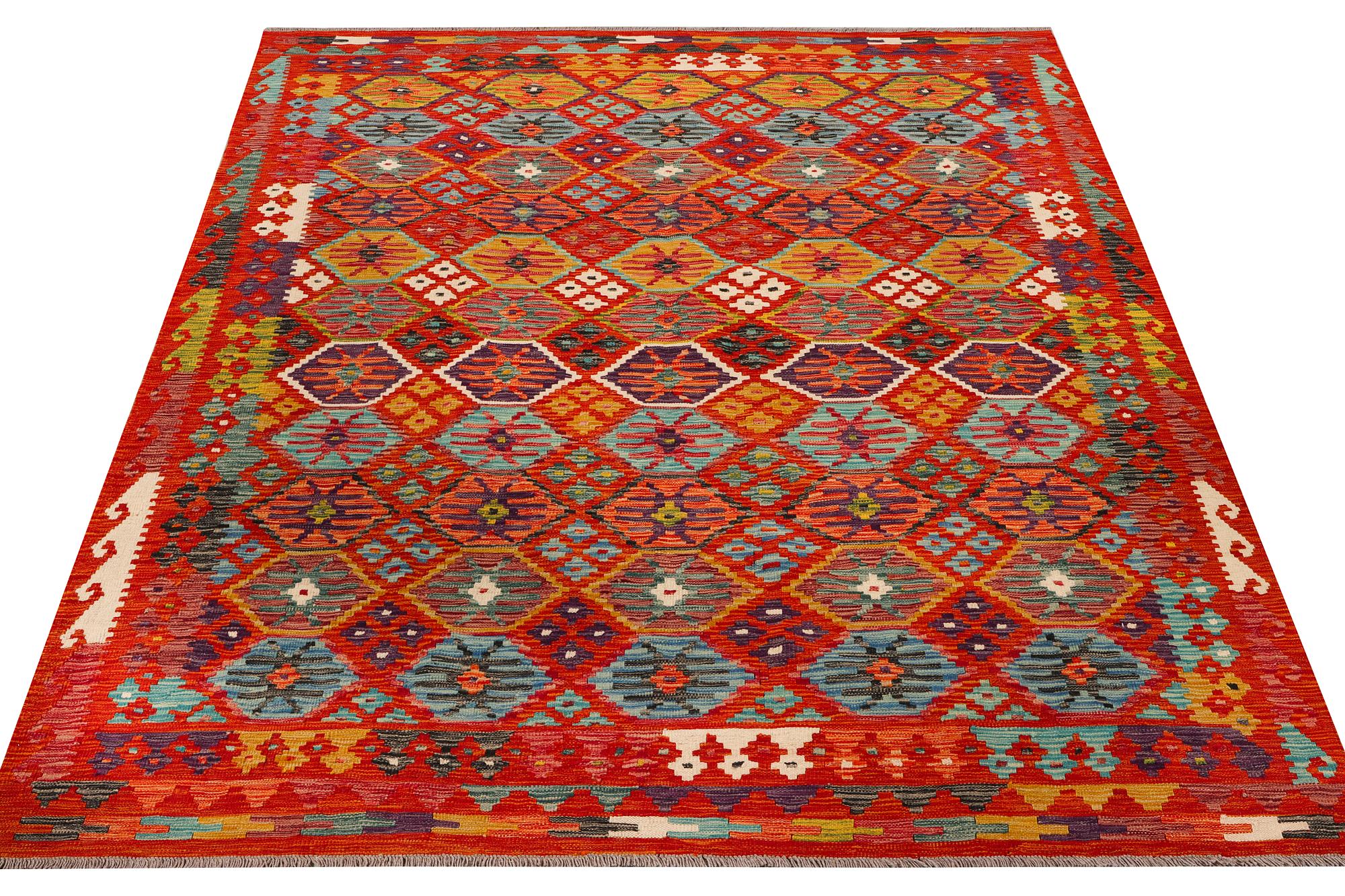 An Afghan kilim carpet, c. 257 x 202 cm.