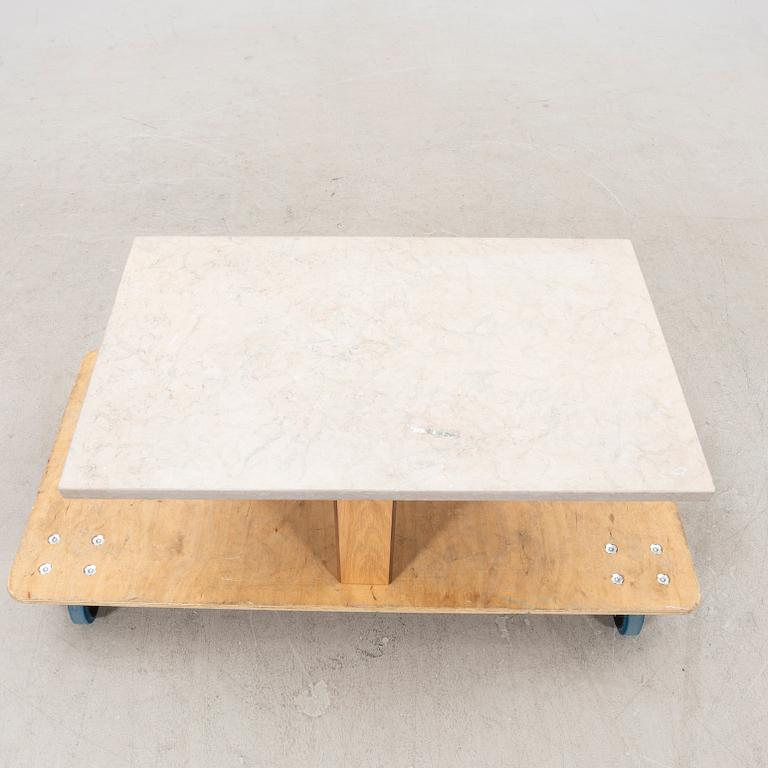 A 21st century limestone coffee table.