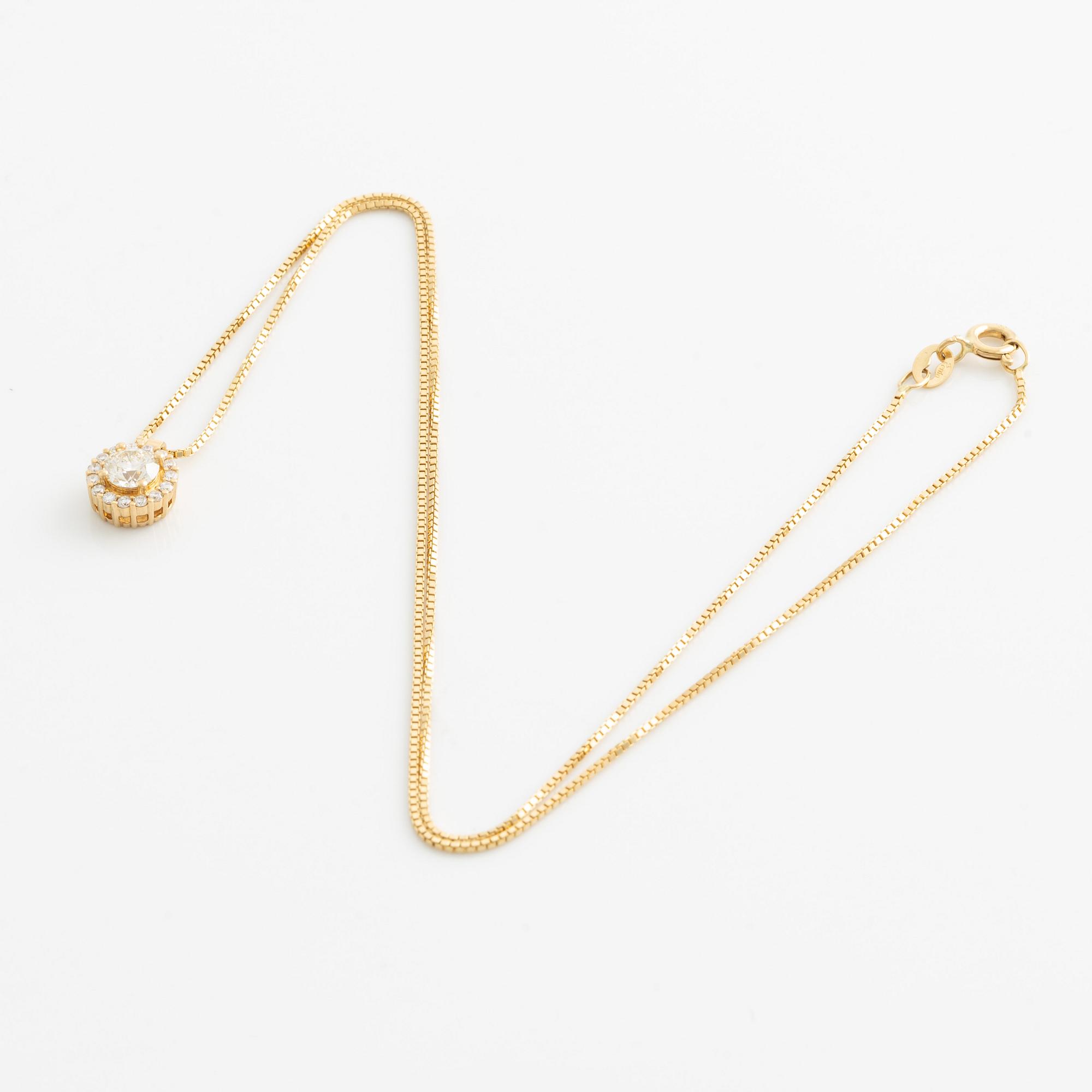 Hängsmycke 18K guld med runda briljantslipade diamanter.