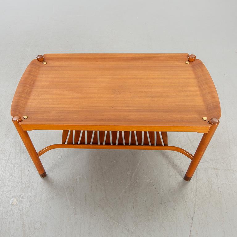 An NK  1950/60s teak coffee table.