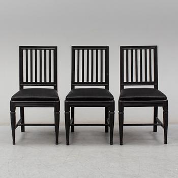 a set of three gustavian chairs.