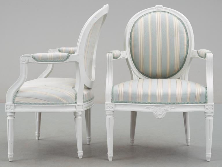 A pair of Gustavian late 18th Century armchairs.