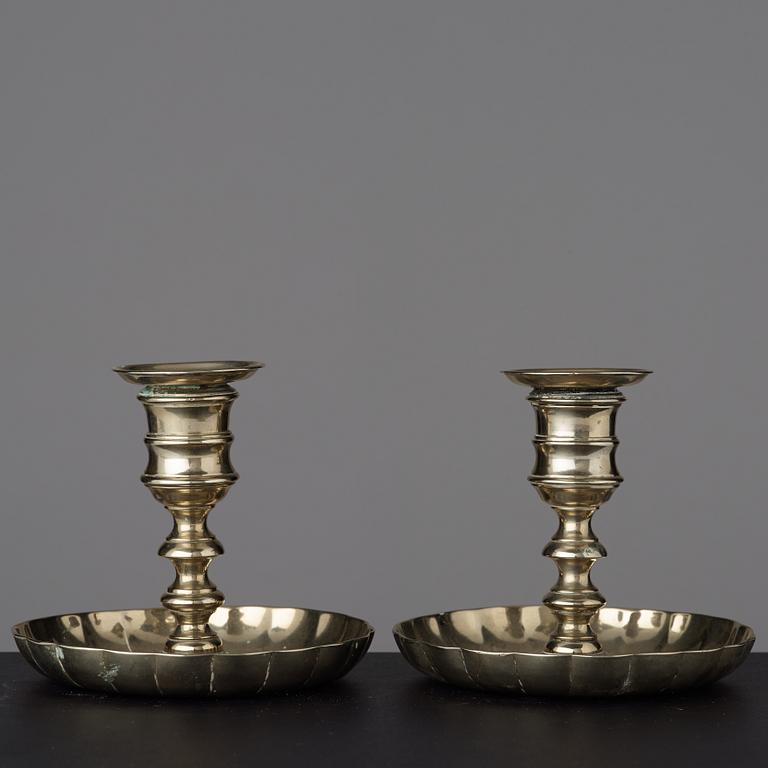 A pair of 18th century candlesticks.