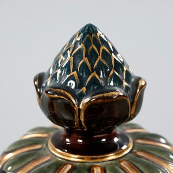 A majolica urn with pedestal from Rörstrand, around the year 1900.