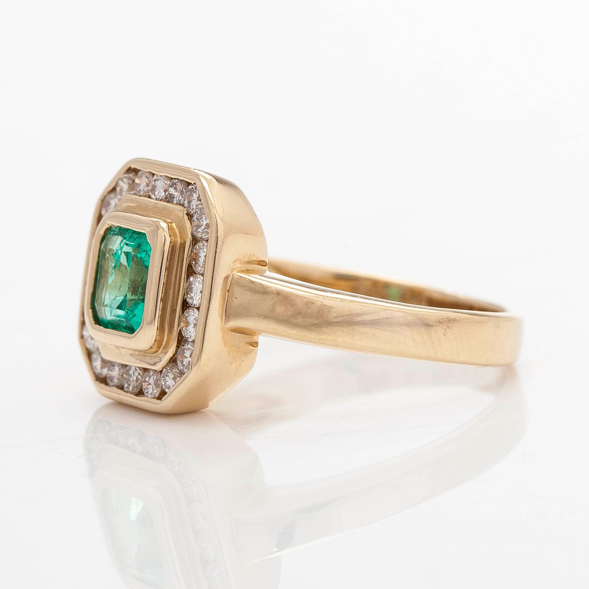 Ring, 14K gold, with an emerald and diamonds. Finnish import marks 1997.