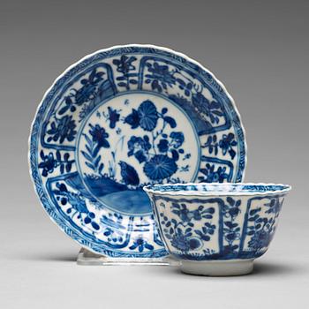 899. Seven matched blue and white cups with four dishes, Qing dynasty, Kangxi (1662-1722).