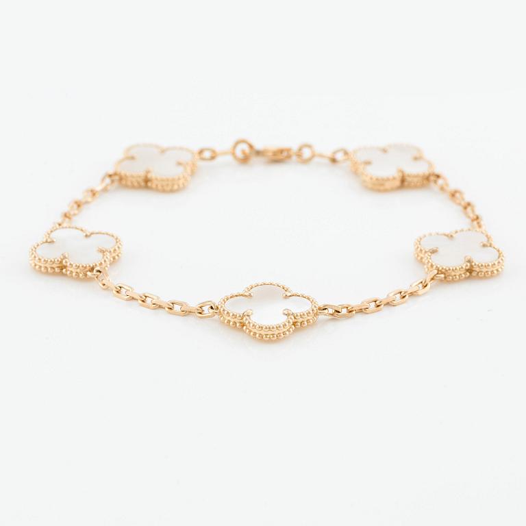 An 18K gold and mother-of-pearl Van Cleef & Arpels "Alhambra" bracelet.