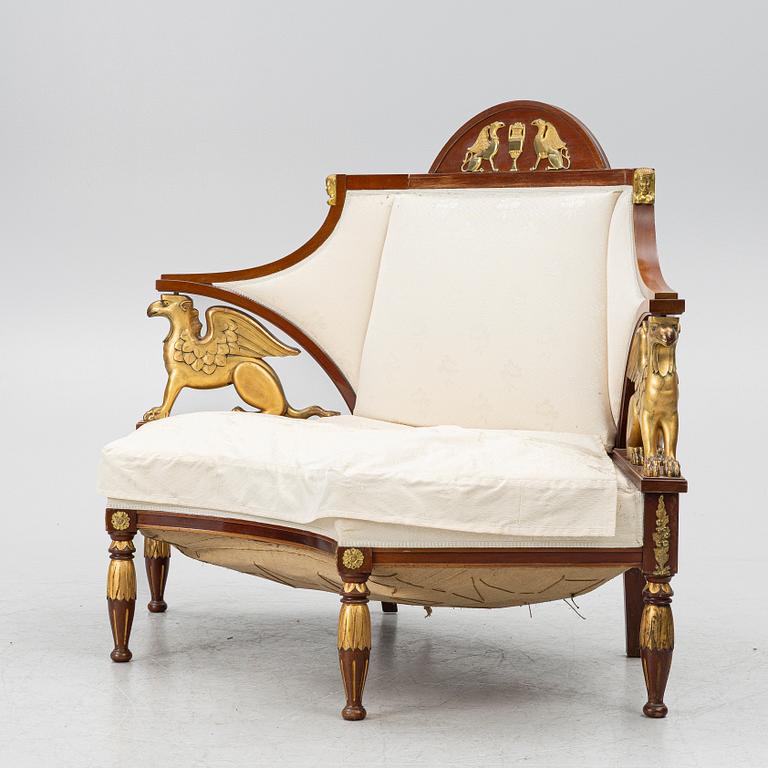 An Empire-style sofa, around 1900.
