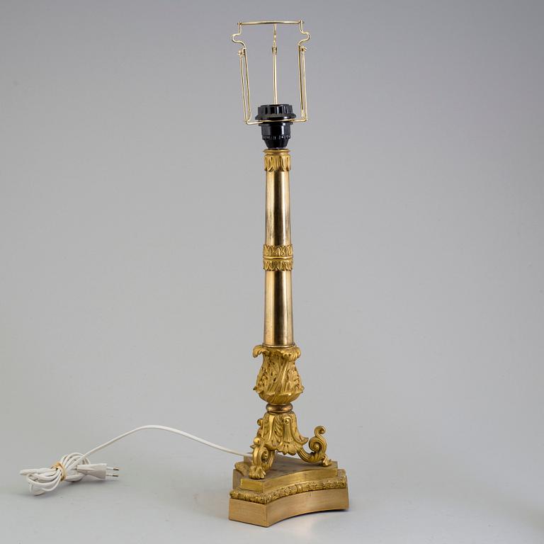 A LATE EMPIRE ORMOLU TABLE LAMP, mid 19th century.