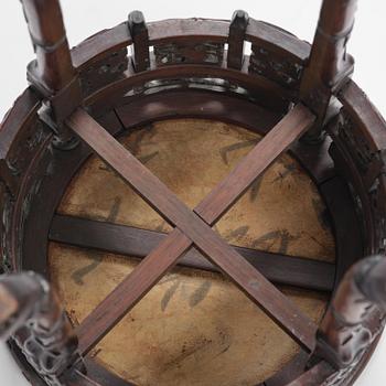 A Chinese hardwood table with a marble top, late Qing dynasty.