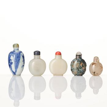 A group of five Chinese snuff bottles with covers, Qing dynasty and later.