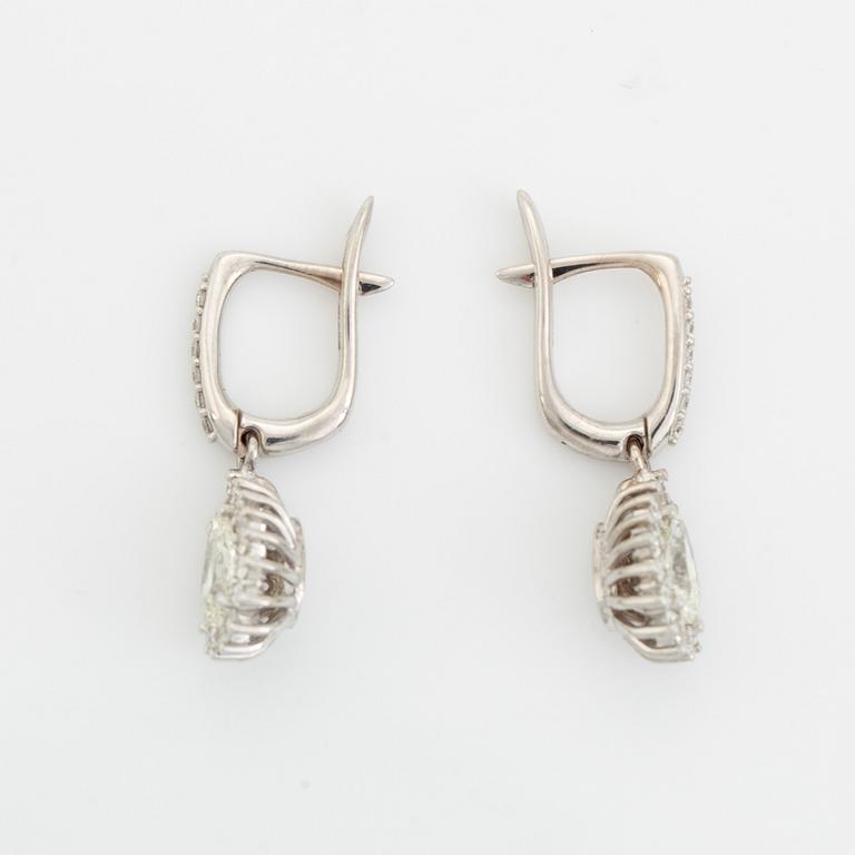 Pear shaped diamond earrings.